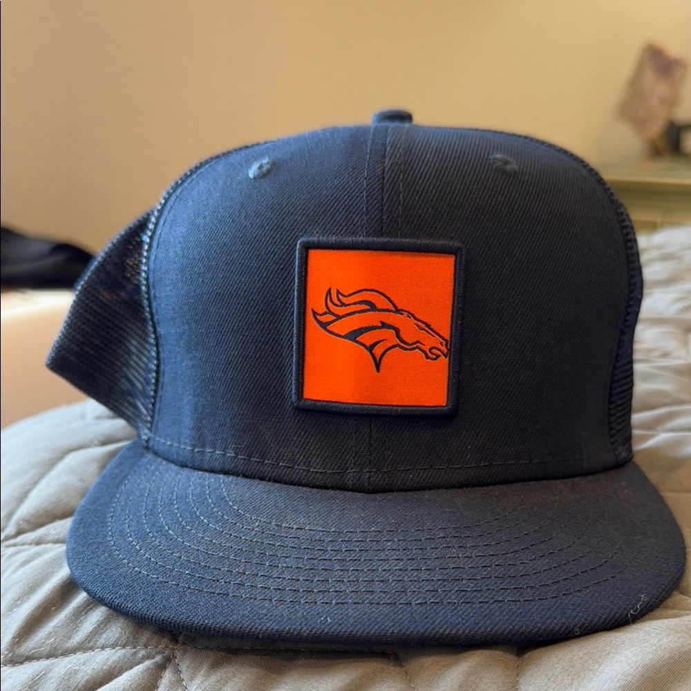 Navy Mesh Trucker Hat with Orange Logo